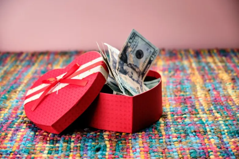 Heart-shaped box with money