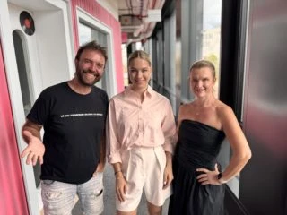 Three women posing together