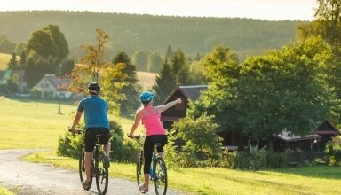 Cycling couple on path