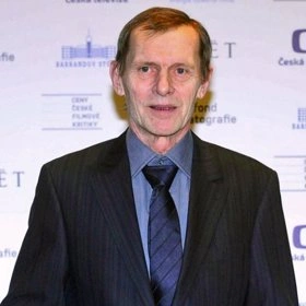 Portrét herce Jiřího Schmitzera na události.