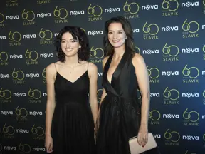 Two women in black dresses