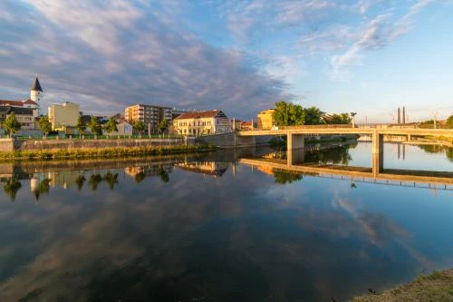 River and cityscape at sunset