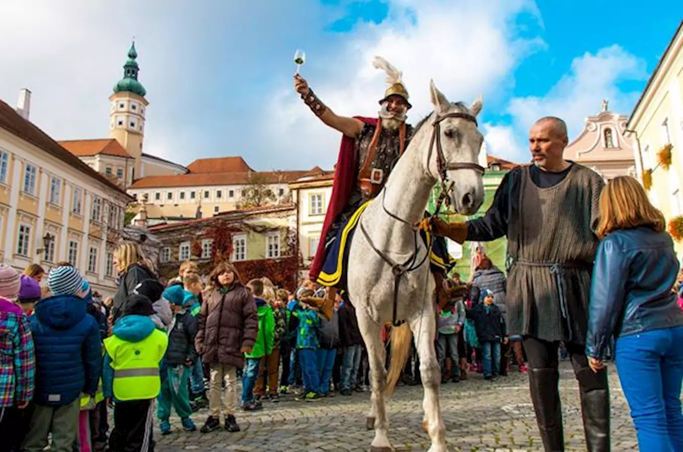 St. martin on horseback raising glass of wine