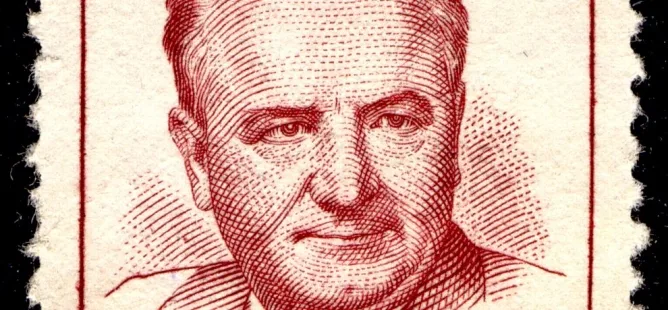 Portrét Klimenta Gottwalda v červeném tisku na papíru.