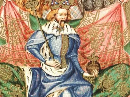 Karel IV sedící na trůně s korunou a křížem v rukou.