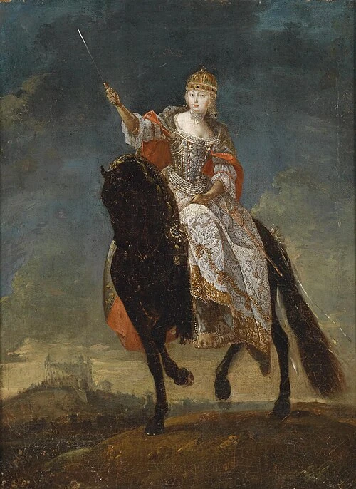 Portrét císařovny Marie Terezie na koni s hůlkou v ruce.